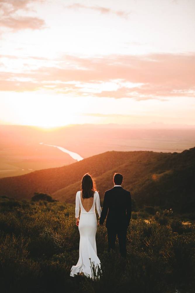 Outdoor Eastern Cape wedding ceremony overlooking rolling hills